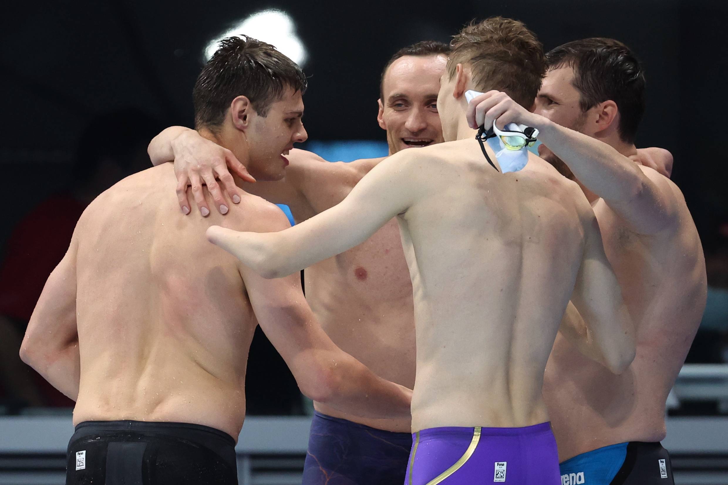 Swimmers from the Russian Paralympic Committee team celebrates after winning the men's 4x100m medley relay 34 points final. | REUTERS