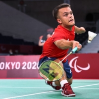 Britain\'s Jack Shephard in action against Hong Kong\'s Man Kai Chu in the men\'s SH6 group play stage of men\'s badminton  | REUTERS