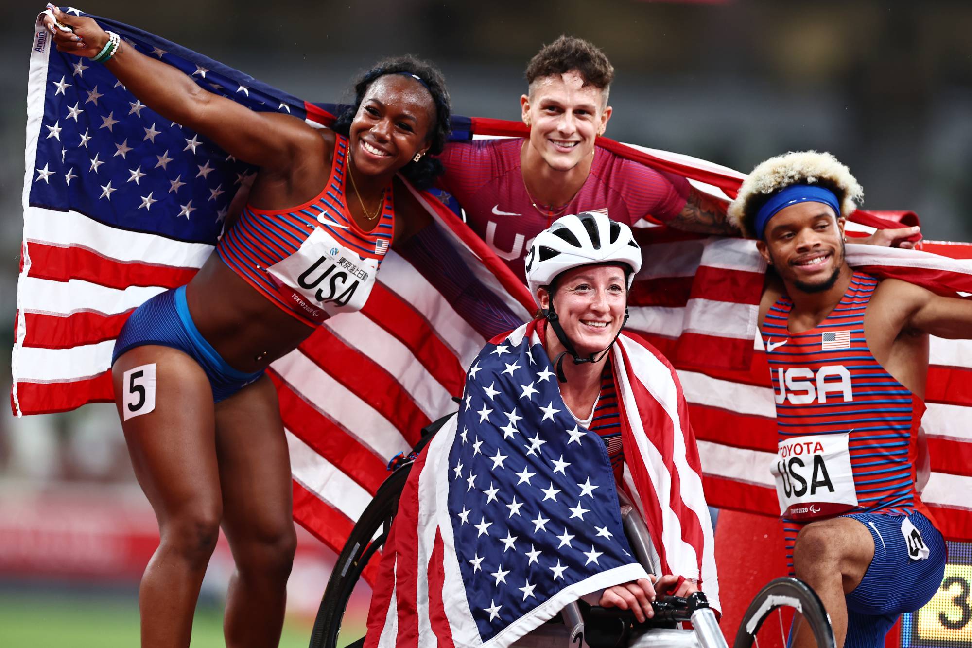 Team USA celebrates after winning the final of the 4x100m universal relay. | REUTERS