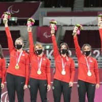 Turkey celebrates during the women\'s goalball medal ceremony in Chiba on Friday. | KYODO