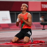 Morocco\'s Ayoub Sadni after winning gold and setting a new world record in the men\'s T47 400 meters | REUTERS