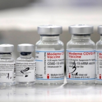 Vials of COVID-19 vaccines developed by Pfizer-BioNTech and Moderna | REUTERS