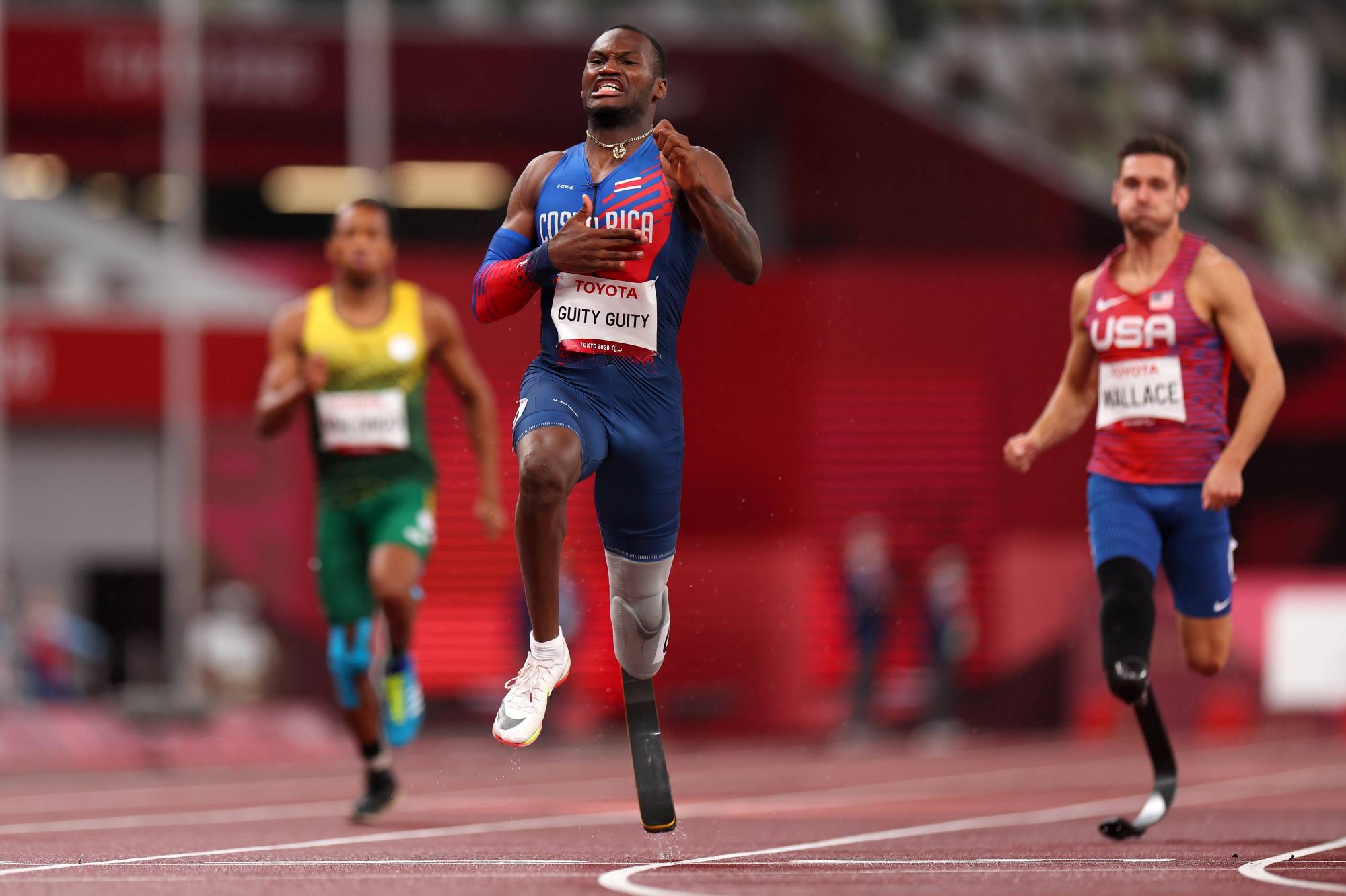Costa Rica's Sherman Isidro Guity Guity crosses the finish line to take gold in the men's T64 200 meters. | REUTERS