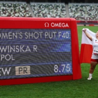 Poland\'s Renata Sliwinska celebrates her gold medal and setting a new Paralympic record in the F40 women\'s shot put. | REUTERS