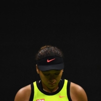 After her third-round loss in the U.S. Open, Naomi Osaka has suggested she may take a break from the game. | AFP-JIJI