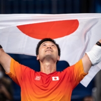 Shingo Kunieda celebrates after winning gold in the men\'s wheelchair tennis final on Saturday at Ariake Tennis Park. | AFP-JIJI