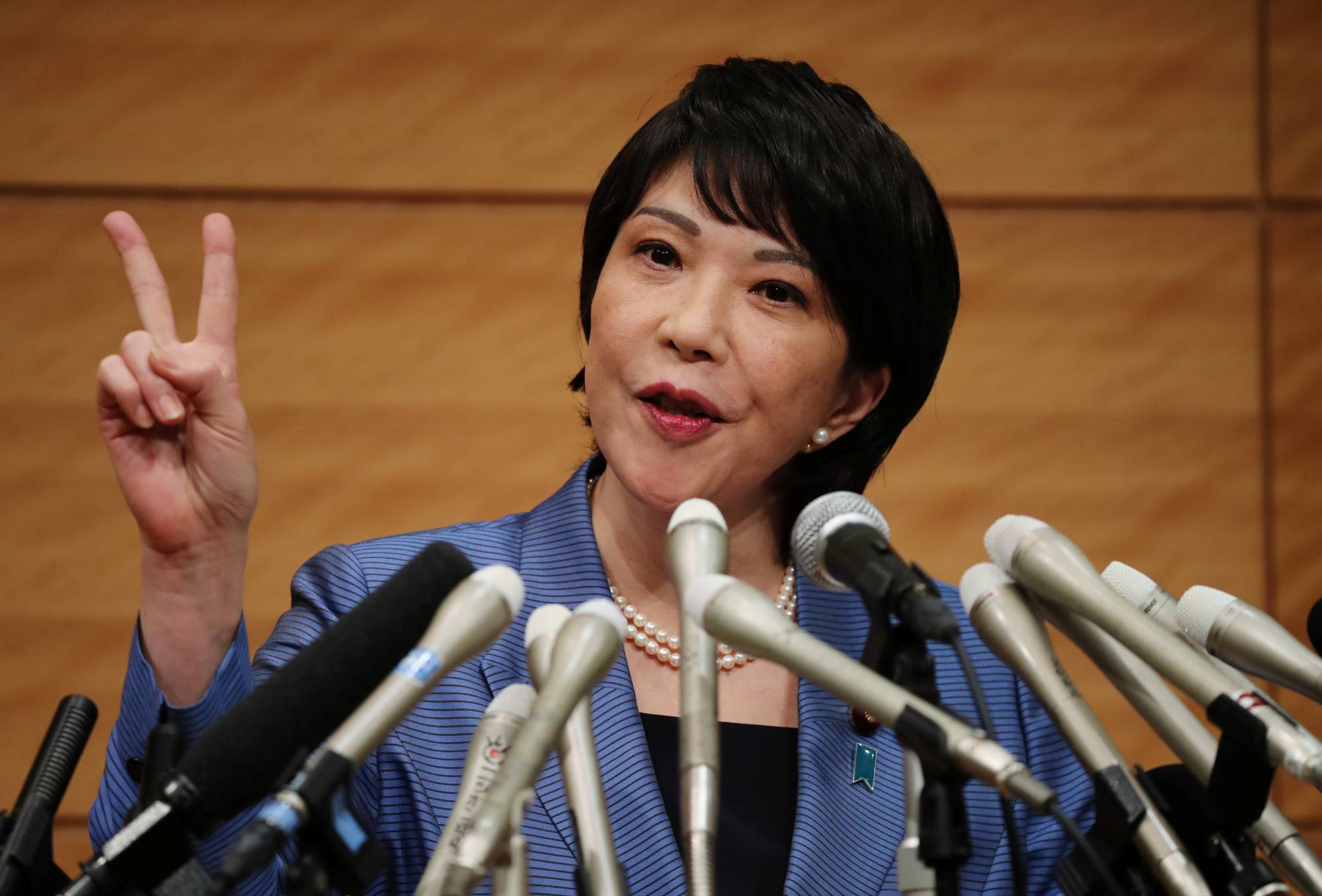 Sanae Takaichi speaks at a news conference to announce her candidacy in the Liberal Democratic Party leadership race in Tokyo on Wednesday. | REUTERS