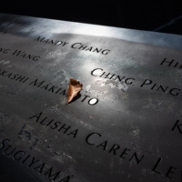 Names of the dead at the 9/11 Memorial & Museum in New York on Aug. 12 | TODD HEISLER / THE NEW YORK TIMES