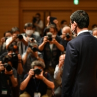 The vaccine chief’s announcement will surely heat up the party’s presidential race — which will effectively decide Suga’s replacement as prime minister ahead of the Lower House election. | RYUSEI TAKAHASHI

