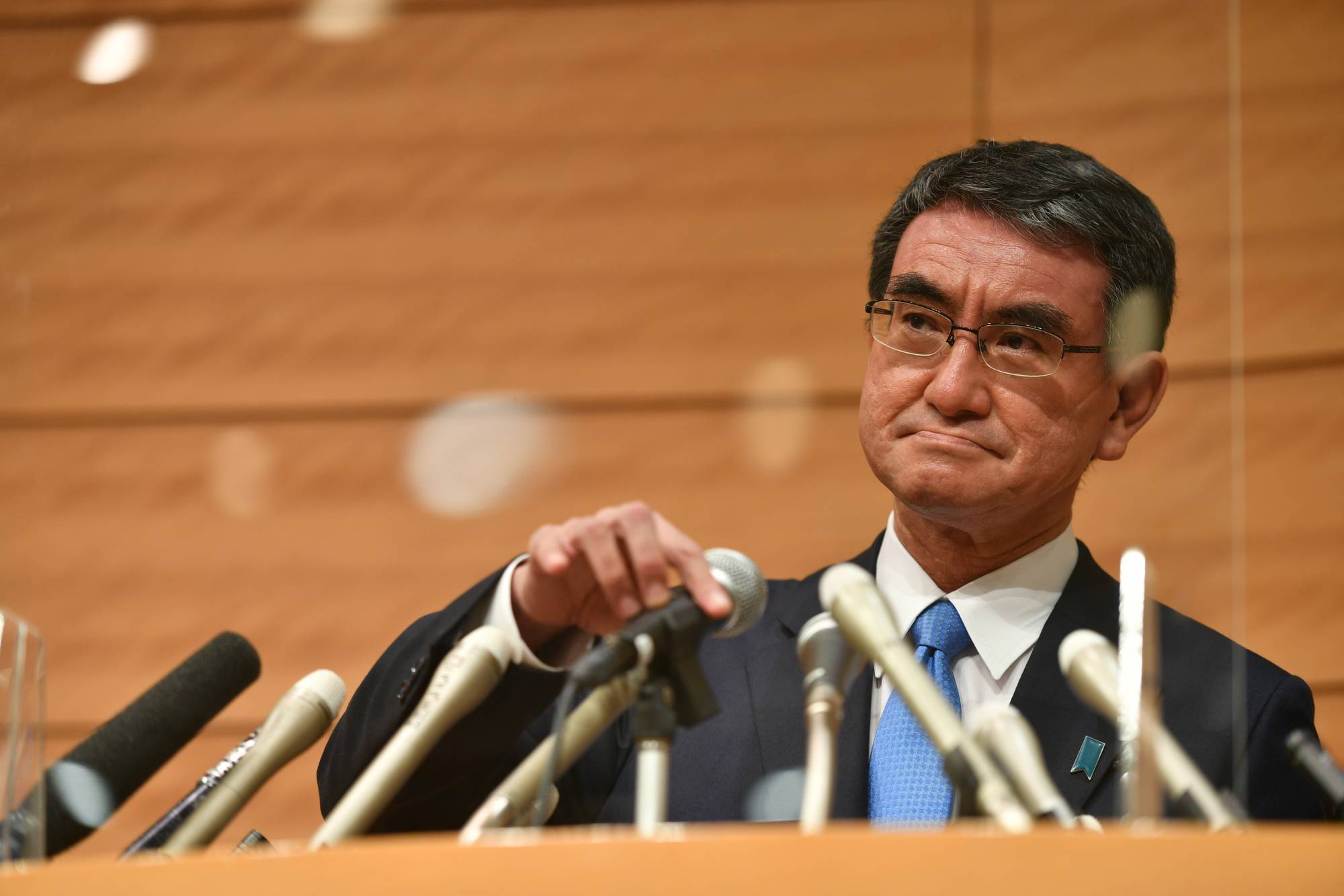 Vaccine chief Taro Kano announces his candidacy for the LDP presidential race, on Friday in Tokyo. | RYUSEI TAKAHASHI