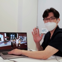 Shaun shows his avatar in Decentraland.  | REUTERS 