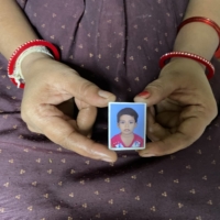 Nisha Umashankar Dandekar shows a picture of her 5-year-old daughter, who died in a leopard attack last year in Chandrapur. | THOMSON REUTERS FOUNDATION