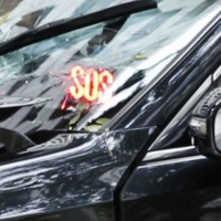 An emergency sign had been activated on a taxi that caused a deadly accident in Tokyo on Saturday. | KYODO