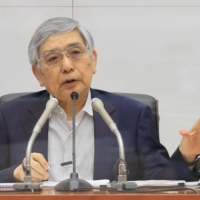 Once seen as a symbol of decisive monetary easing, Bank of Japan Gov. Haruhiko Kuroda appears to be taking a back as his program of risky asset purchases has been unsuccessful in managing deflation. | BLOOMBERG