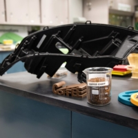 Ford Motor is making a headlamp in part from coffee chaff, the unusable skin of roasted beans. | FORD MOTOR CO. / VIA THE NEW YORK TIMES