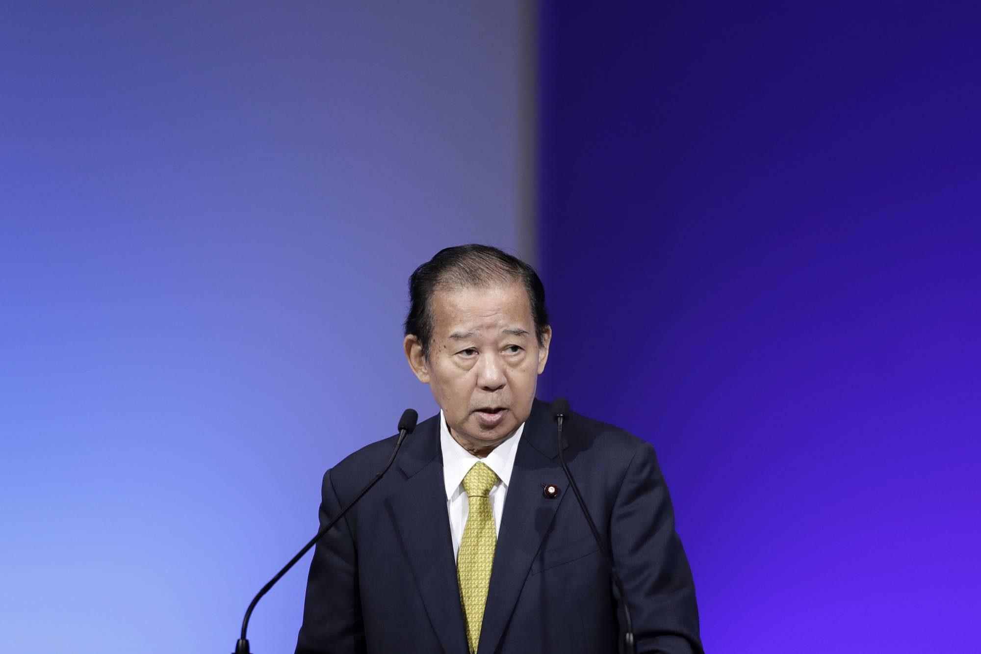 Liberal Democratic Party Secretary-General Toshihiro Nikai speaks at his party's annual convention in 2019. | BLOOMBERG