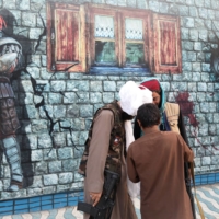 Taliban soldiers at an amusement park in Kabul on Sept. 8 | WEST ASIA NEWS AGENCY / VIA REUTERS 