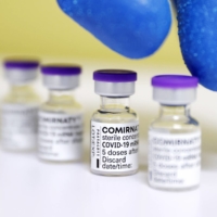 Vials of Pfizer Inc.\'s COVID-19 vaccine in February | KYODO
