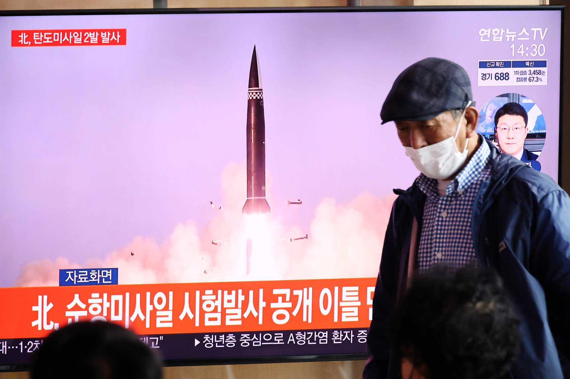 A TV broadcasting file footage of a North Korean missile test, in Seoul on Wednesday | REUTERS
