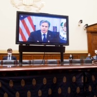 U.S. Secretary of State Antony Blinken testifies via a video link on the American withdrawal from Afghanistan during a House Foreign Affairs Committee hearing in Washington on Monday.  | AFP-JIJI