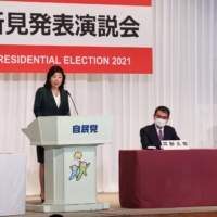Seiko Noda, former communications minister of Japan, delivers her campaign speech for the Liberal Democratic Party\'s presidential election as other candidates look on in Tokyo on Friday. | BLOOMBERG