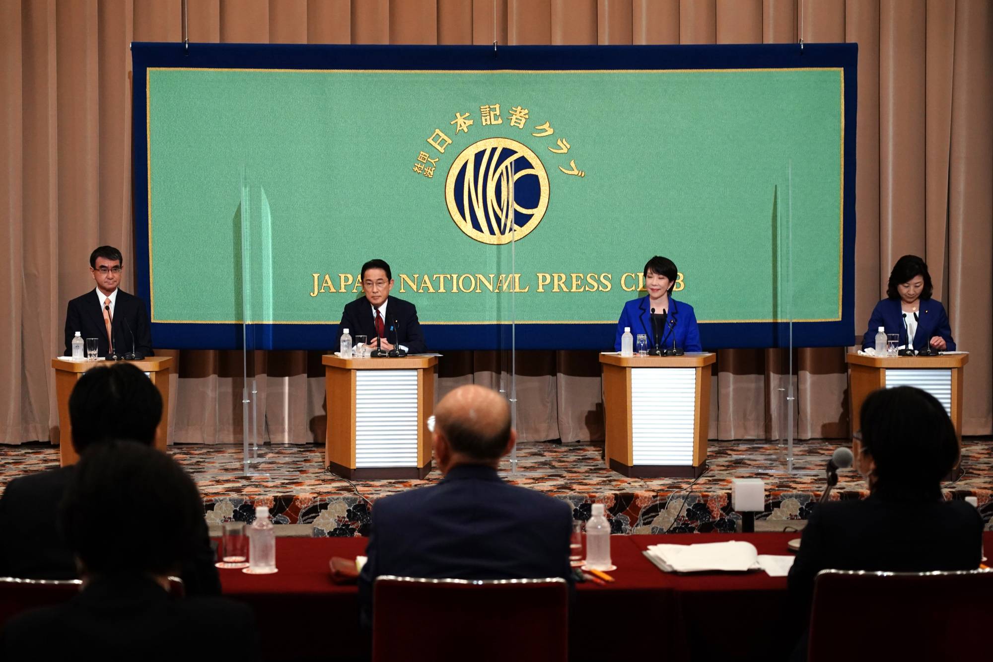 There were stark differences between the candidates on Japan’s future energy policy and the roles nuclear power and renewable energy should play. | Bloomberg