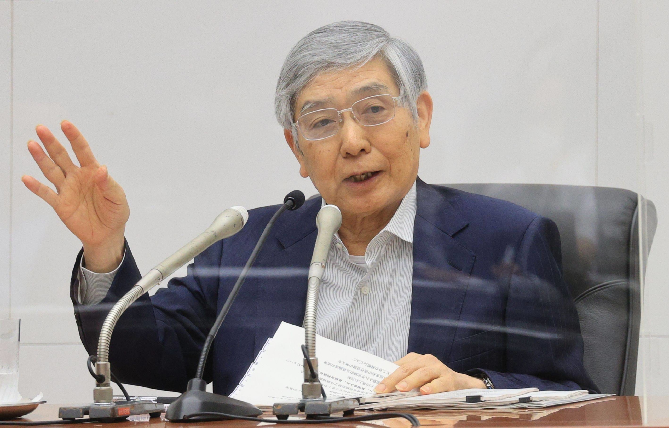 Haruhiko Kuroda, governor of the Bank of Japan, speaks during a news conference in Tokyo in July. | BLOOMBERG