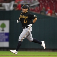 Pirates right-fielder Yoshitomo Tsutsugo rounds the bases after hitting a solo home run against the Reds on Monday in Cincinnati, Ohio. | USA TODAY / VIA REUTERS