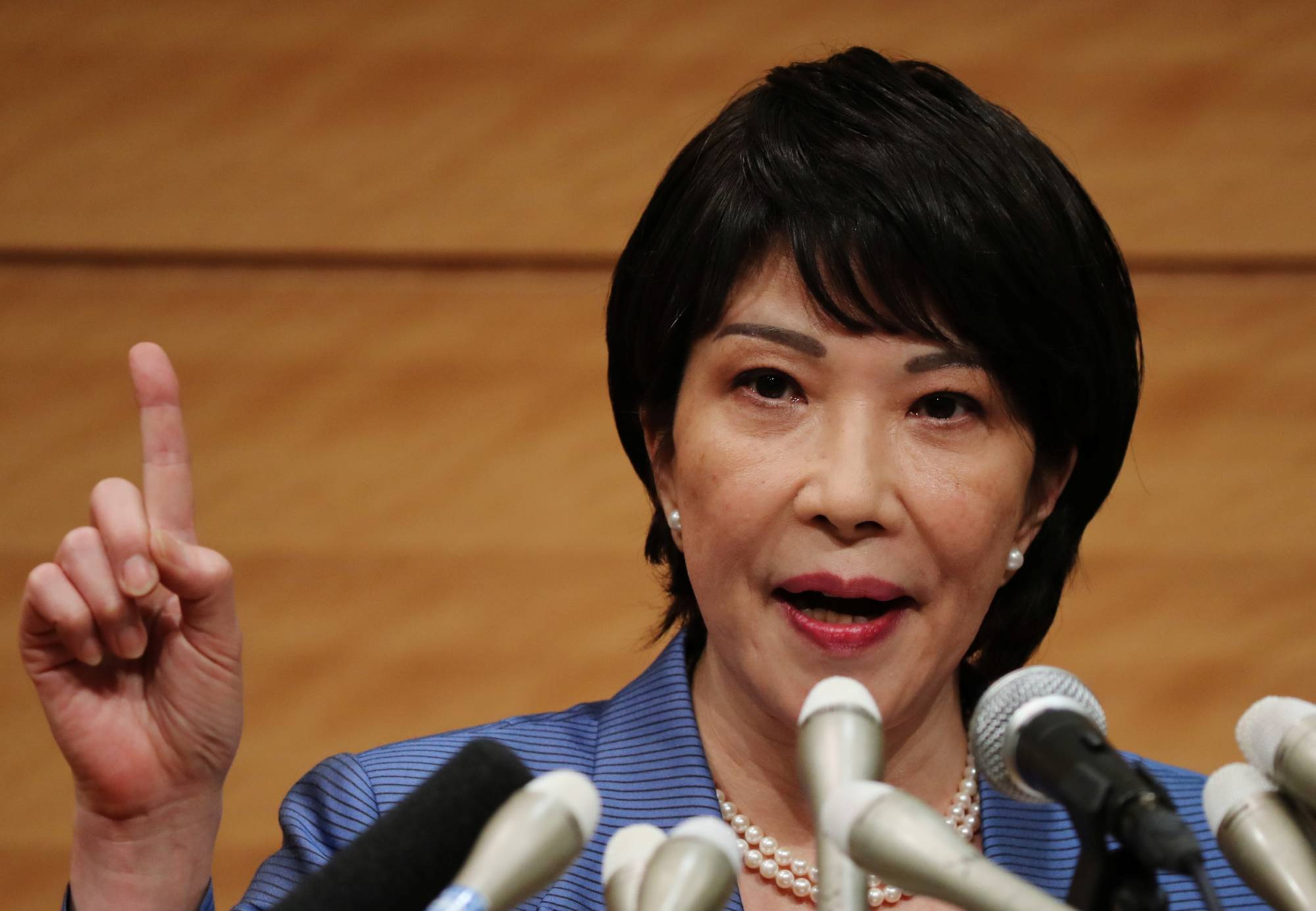 Lawmaker Sanae Takaichi speaks at a news conference to announce her running in the Liberal Democratic Party leadership race to succeed Prime Minister Yoshihide Suga. | REUTERS
