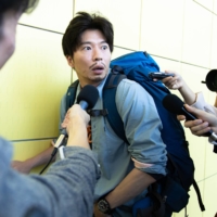 Kei Tanaka stars in “First Gentleman” as a happy-go-lucky ornithologist who returns from a work trip to discover that his wife has become Japan’s first female premier. | © 2021 “FIRST GENTLEMAN” FILM PARTNERS
