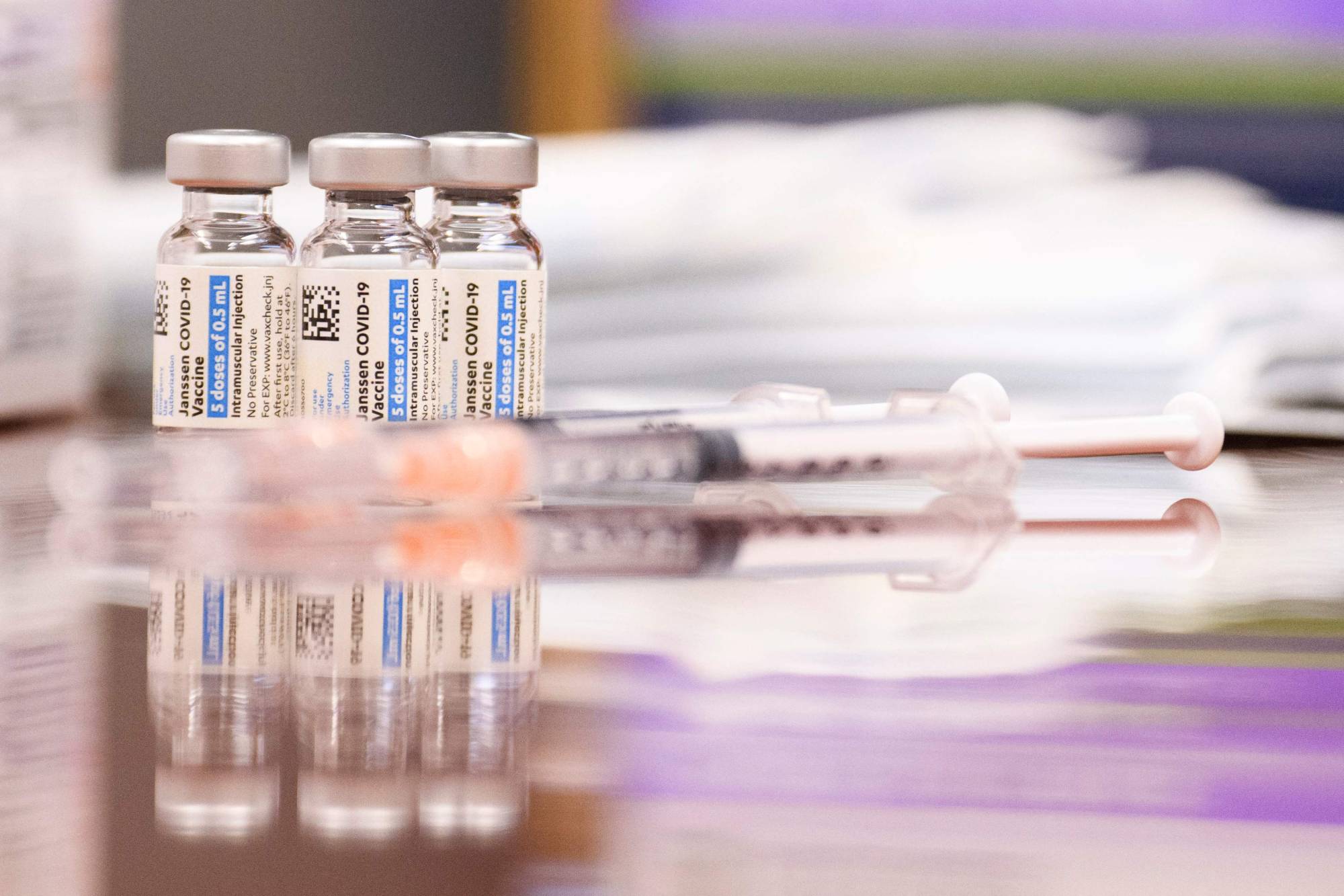 Vials and syringes of the Johnson and Johnson COVID-19 vaccine are displayed at a clinic in California. | AFP-JIJI