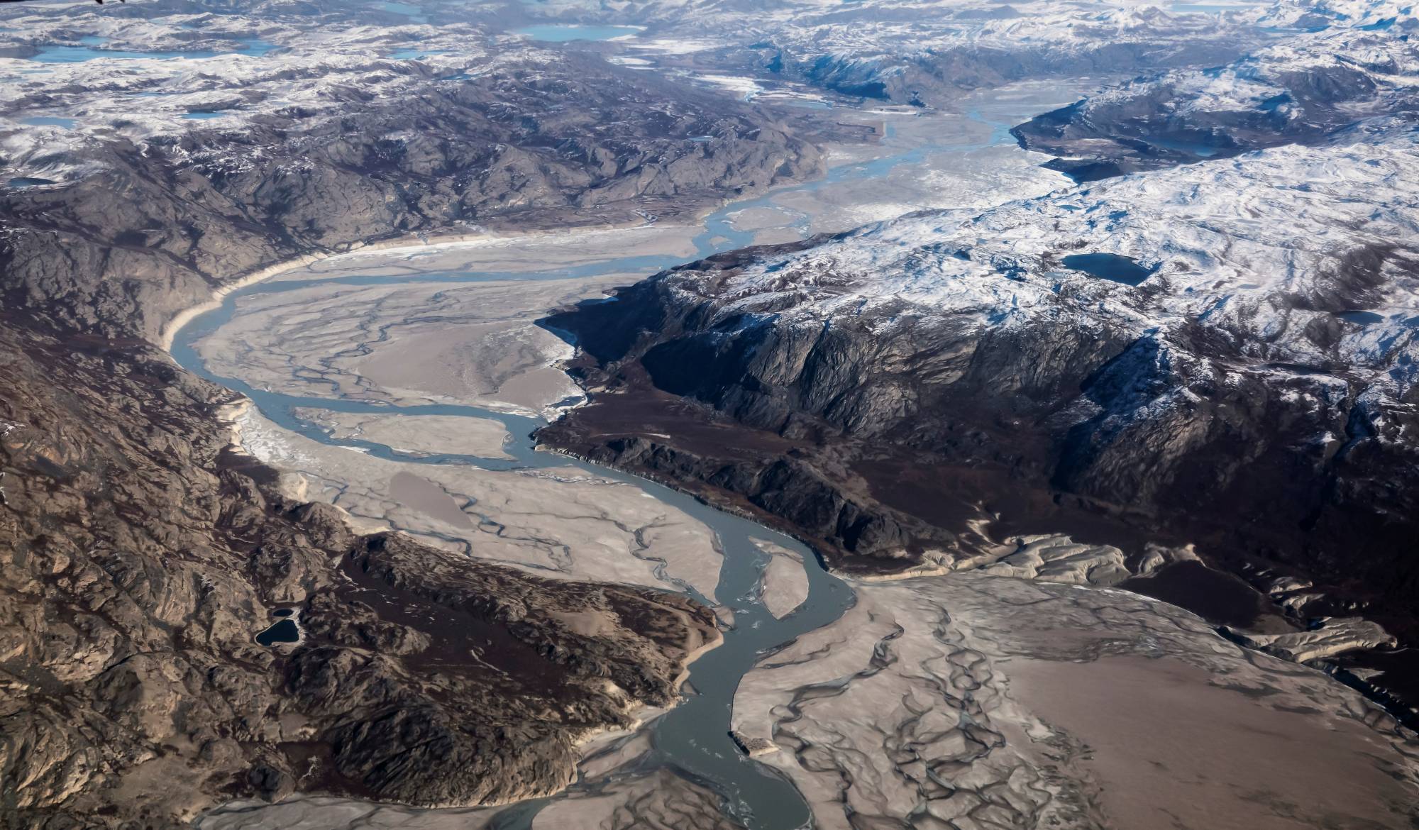 Melting ice and glacier mud near Kangerlussuaq, Greenland, on Sept. 17. | Reuters
