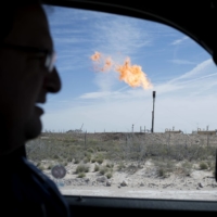 A gas flare near Mentone, Texas. In the coming weeks, the U.S. government will propose the most aggressive federal methane mandates yet for oil and gas wells. | BLOOMBERG 
