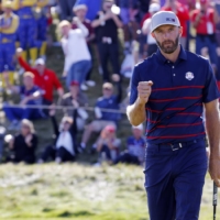 American Dustin Johnson holes his birdie putt on the 11th green at Whistling Straits in Sheboygan, Wisconsin, on Friday.  | REUTERS
