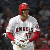 Los Angeles Angels designated hitter Shohei Ohtani reacts after being walked by the Seattle Mariners in the ninth inning on Friday.  | USA TODAY / VIA REUTERS