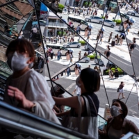Some Bank of Japan policymakers warned of the risk of a delay in the country\'s economic recovery during their meeting in July. | REUTERS