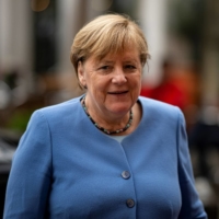 German Chancellor Angela Merkel arrives at a reception in Berlin on Monday.  | POOL / VIA REUTERS