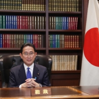 Fumio Kishida, newly elected leader of the Liberal Democratic Party, sits at his office inside the party\'s headquarters in Tokyo on Wednesday. | POOL / VIA BLOOMBERG