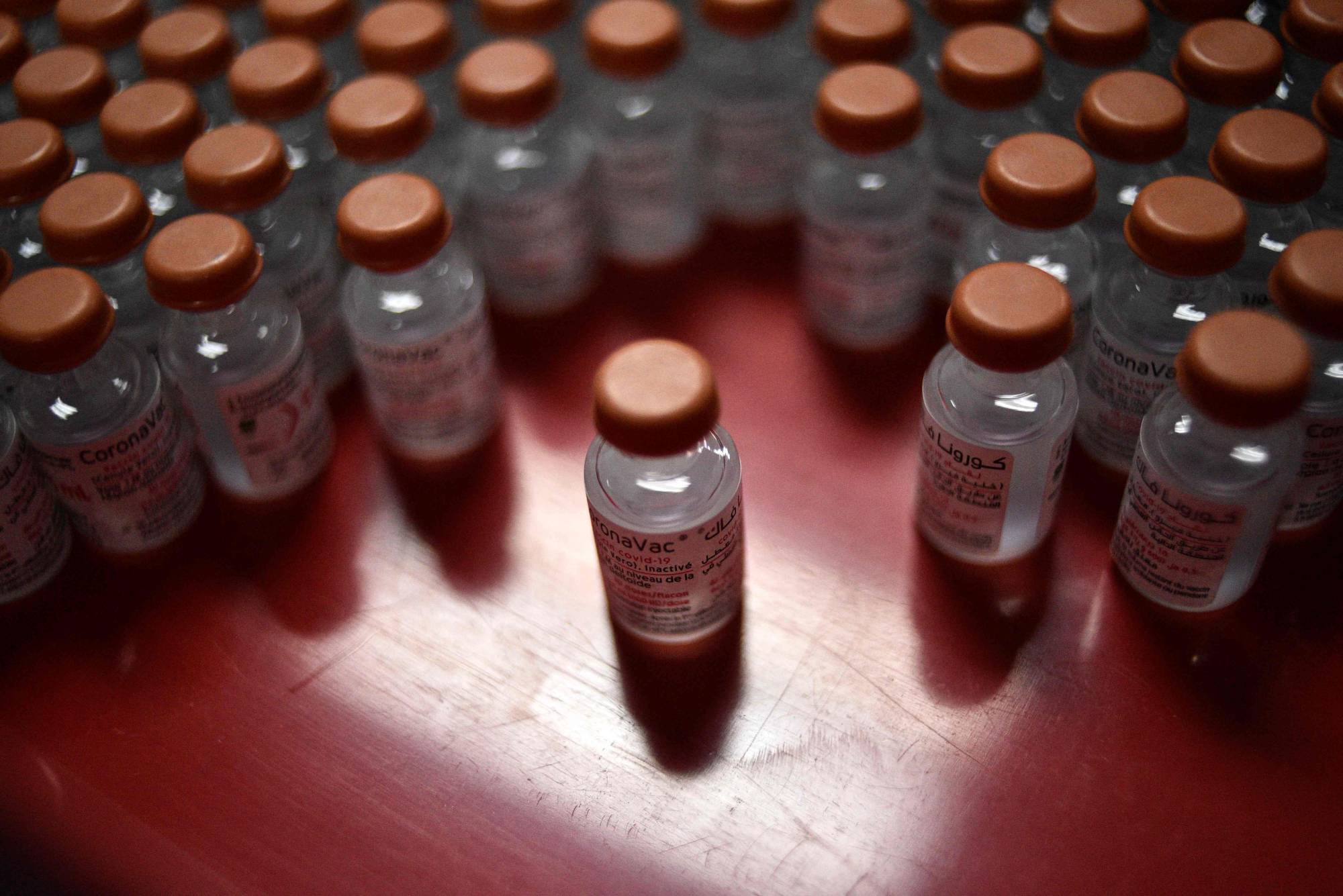 Many governments that once relied on Chinese shots are now ordering or seeking donations of mRNA vaccines instead. | AFP-JIJI