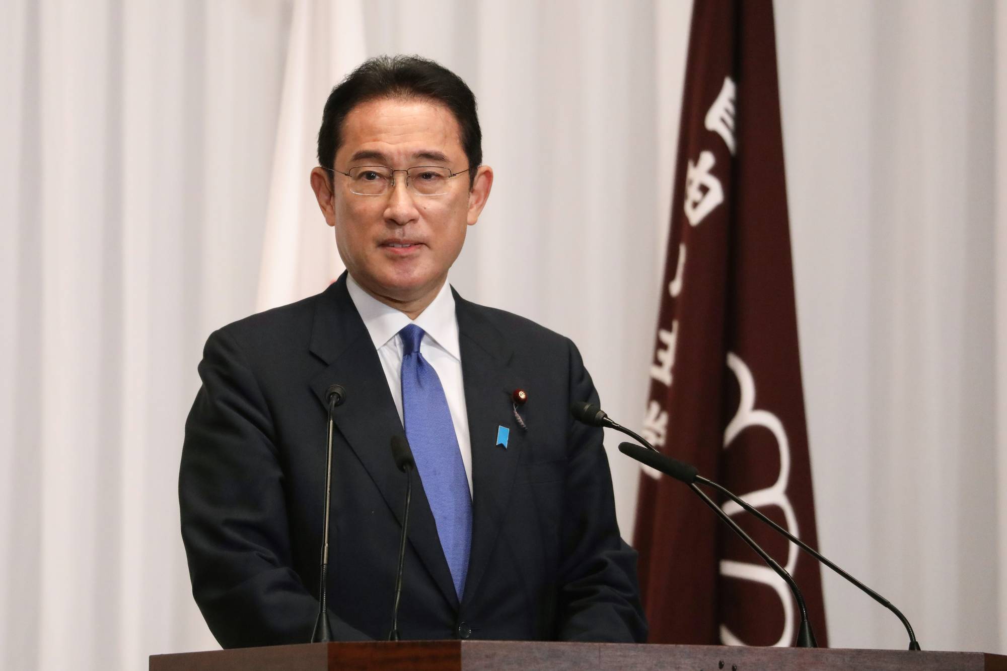 Fumio Kishida, the newly elected leader of the Liberal Democratic Party, during a news conference at the party's headquarters on Wednesday in Tokyo | BLOOMBERG