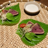 An a la carte side dish of katsuo tataki (lightly seared skipjack) served on egoma (perilla) leaves | ROBBIE SWINNERTON

