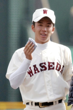 Yuki Saito a national sensation after using a blue handkerchief to wipe away sweat during the National High School Baseball Championship in 2006 at Koshien Stadium in Nishinomiya, Hyogo Prefecture. | KYODO