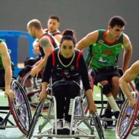 Afghan national women\'s wheelchair basketball team captain Nilofar Bayat (center) plays her debut game for mixed-gender team Bidaideak against Fundacion Vital Zuzenak, in Amurrio, Spain, on Saturday. | REUTERS