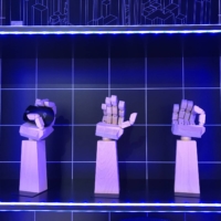 Wooden gaming hands are on display in the Ikea booth at the 2021 Tokyo Game Show. | JASON COSKREY