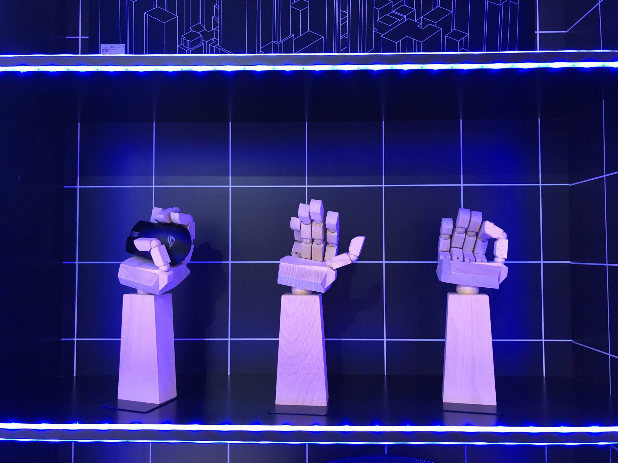 Wooden gaming hands are on display in the Ikea booth at the 2021 Tokyo Game Show. | JASON COSKREY