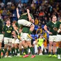 Springboks players react at full time after their win over new Zealand\'s All Blacks in a Rugby Championship game on Saturday in Gold Coast, Australia. | AAP / VIA REUTERS