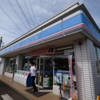 According to a July report from the Japan Franchise Association, the total number of convenience stores in Japan currently stands at 55,931, an increase of more than 10,000 outlets from a decade ago. | BLOOMBERG