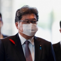Economy minister Koichi Hagiuda arrives at the Prime Minister\'s Office in Tokyo on Monday. | REUTERS