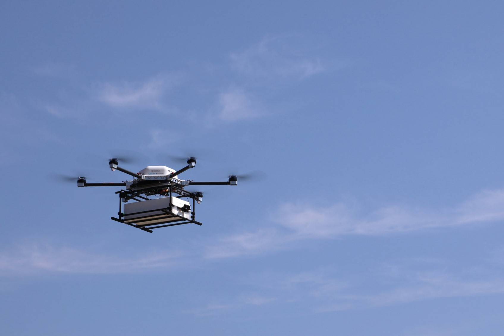 SoftBank Corp.'s drone flies from the fishing port of Susami to a roadside station. | Courtesy of SoftBank Corp. 