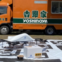 Aeronext Inc. collaborated with fast food chain Yoshinoya in July to deliver residents of Kosuge village gyudon beef bowls prepared in a kitchen car. | COURTESY OF AERONEXT INC.
